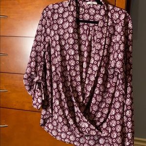 Flattering wrap shirt with option to cuff sleeves.